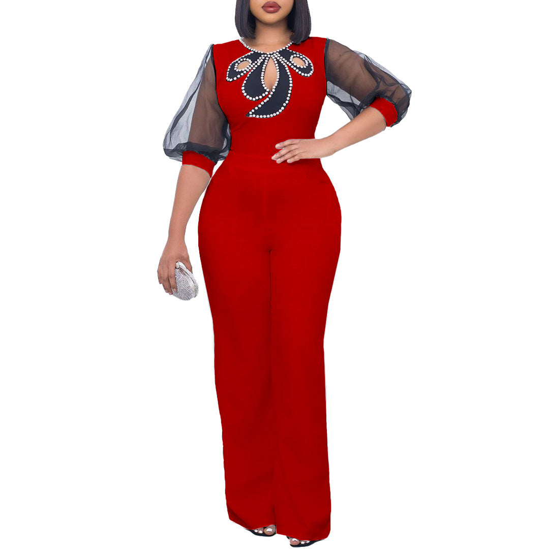 Damen eleganter Jumpsuit mit transparenten Ärmeln und Perlenverzierung Stalluxe
