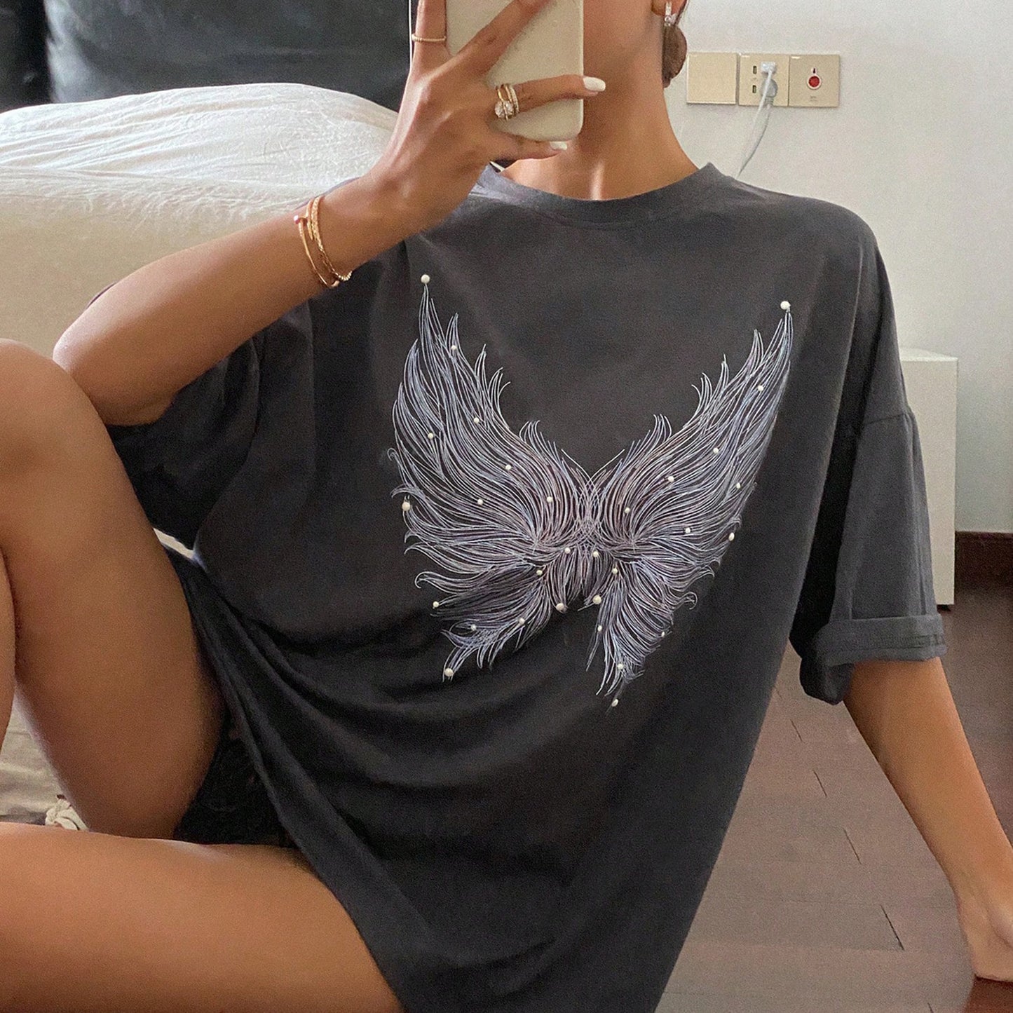 Damen oversized T-Shirt mit kreativem Federmotiv Stalluxe