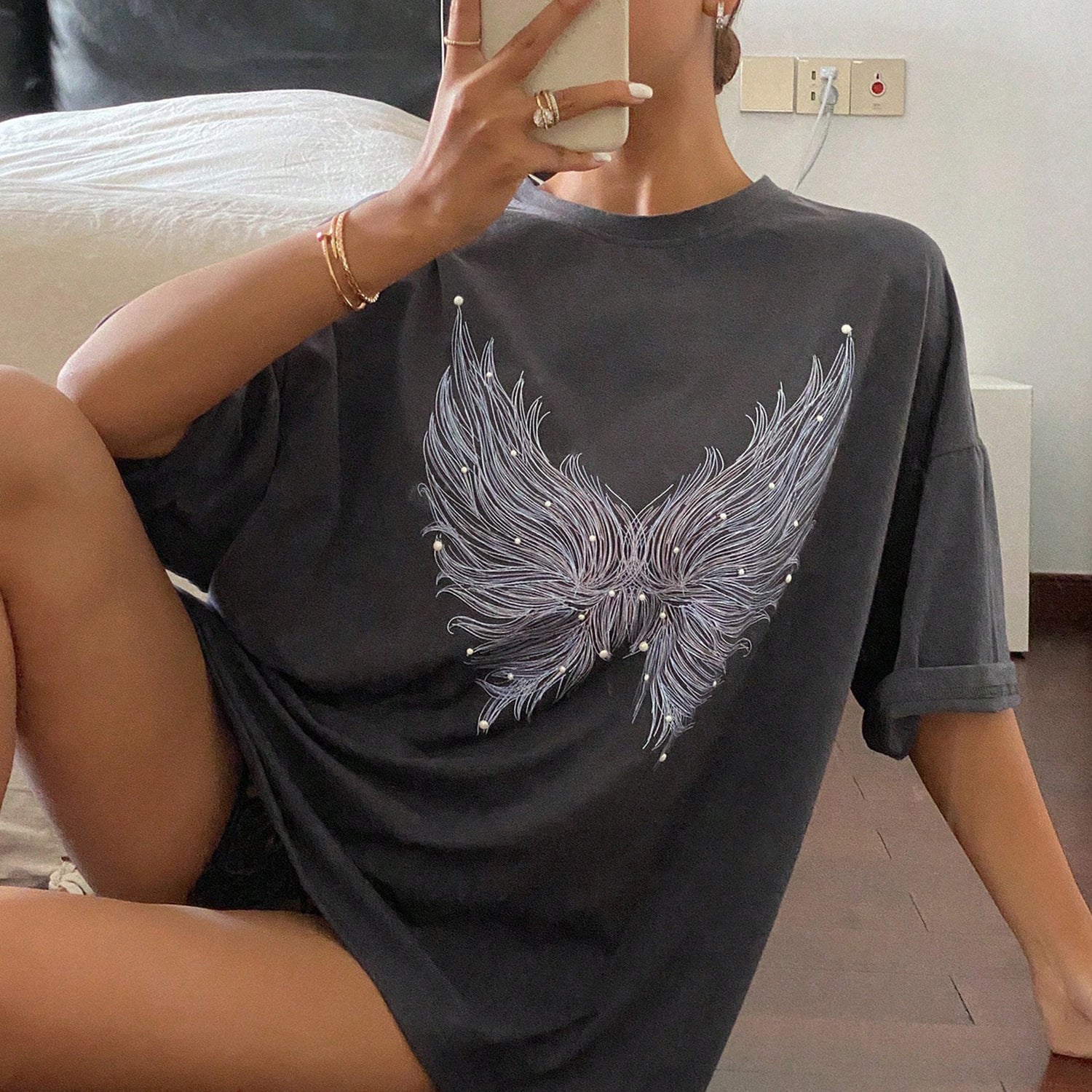 Damen oversized T-Shirt mit kreativem Federmotiv Stalluxe