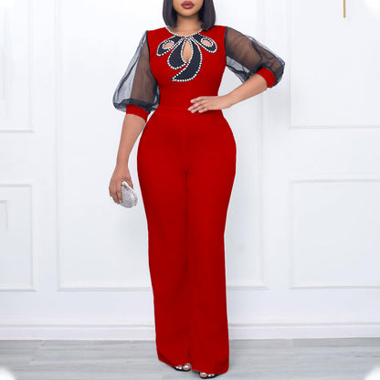 Damen eleganter Jumpsuit mit transparenten Ärmeln und Perlenverzierung Stalluxe