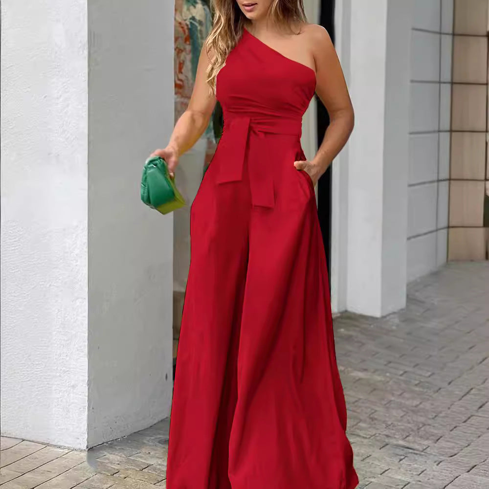 Damen Eleganter Jumpsuit mit asymmetrischem Ausschnitt und Taillengürtel Stalluxe