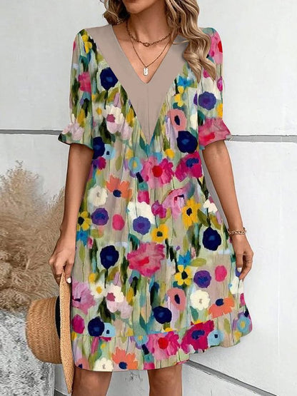 Damen Freizeitkleid mit tiefem V-Ausschnitt und modischen Puffärmeln Stalluxe