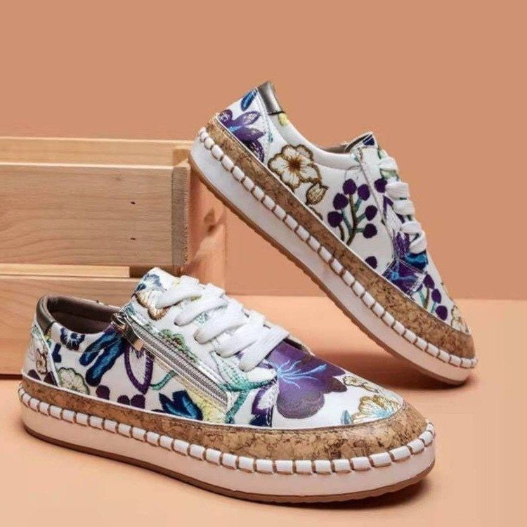 Damen Sportliche Sneakers mit buntem Stoffdesign und elastischer Sohle Stalluxe