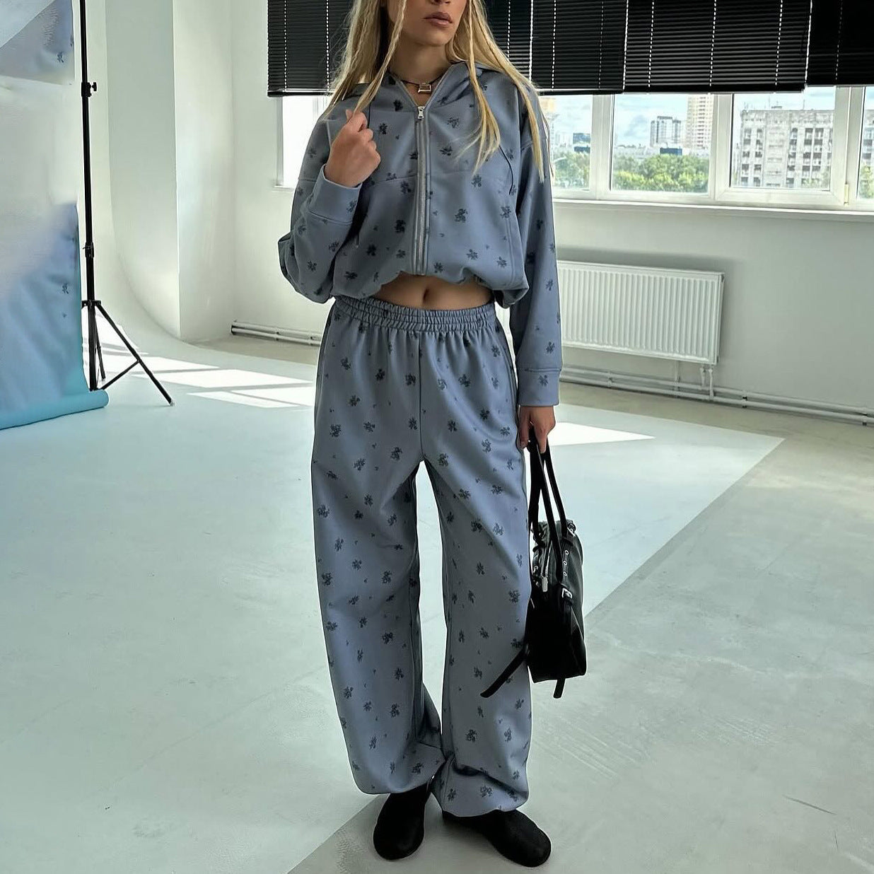 Damen Sportlicher Freizeitanzug mit floralem Muster und hohem Kragen Stalluxe