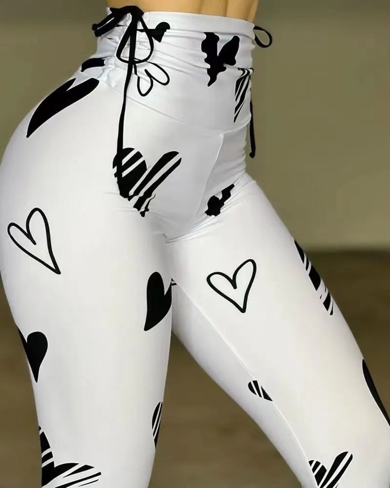 Damen Hochbund-Leggings mit grafischem Herzmuster und hochelastischem Material Stalluxe