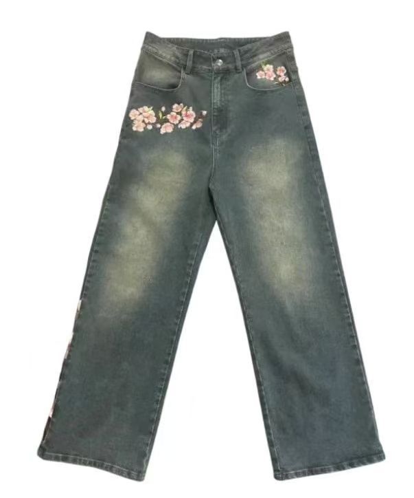 Damen Weite Jeans mit floralen Applikationen Stalluxe