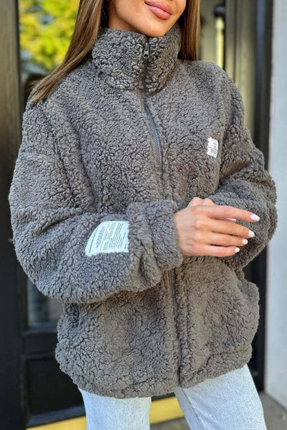 Damen Kuschelige Fleecejacke mit praktischen Taschen und hohen Kragen Stalluxe