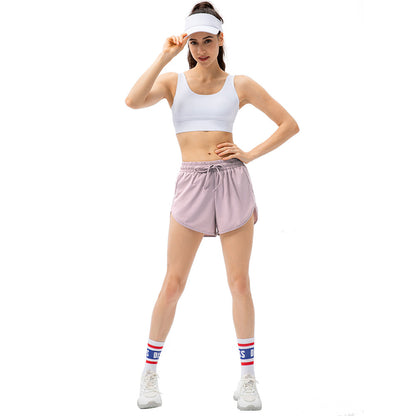 Damen Sportliche Laufshorts mit elastischem Bund und seitlichen Schlitzen Stalluxe