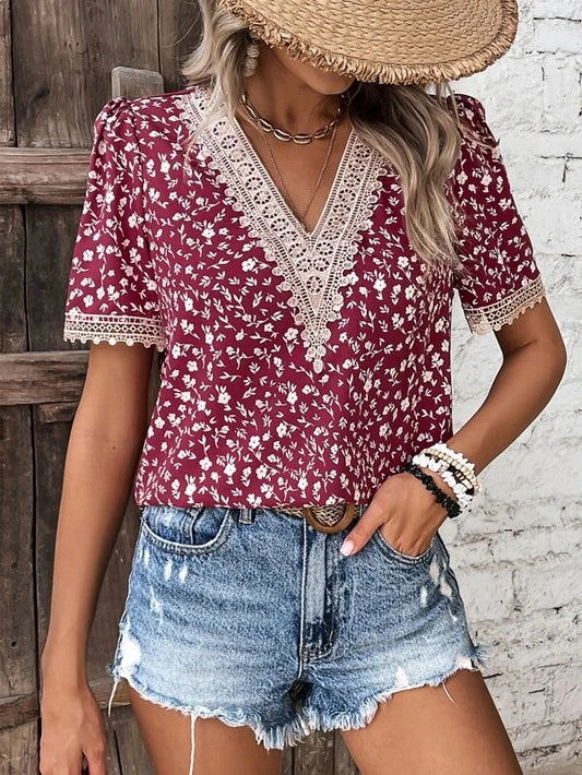 Damen Lockere Bluse mit floralem Muster und Spitzenverzierungen Stalluxe