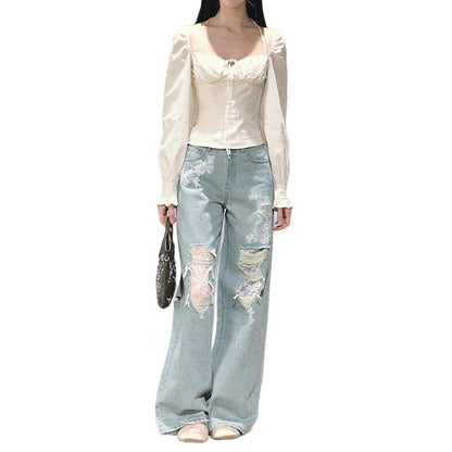 Damen Weit geschnittene Jeans mit individuellen Destroyed-Details und floralem Print Stalluxe