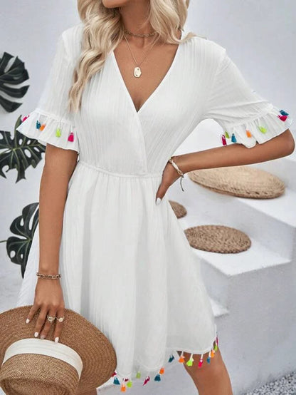 Damen Sommerkleid mit verspielten Volants und bunten Quasten Stalluxe