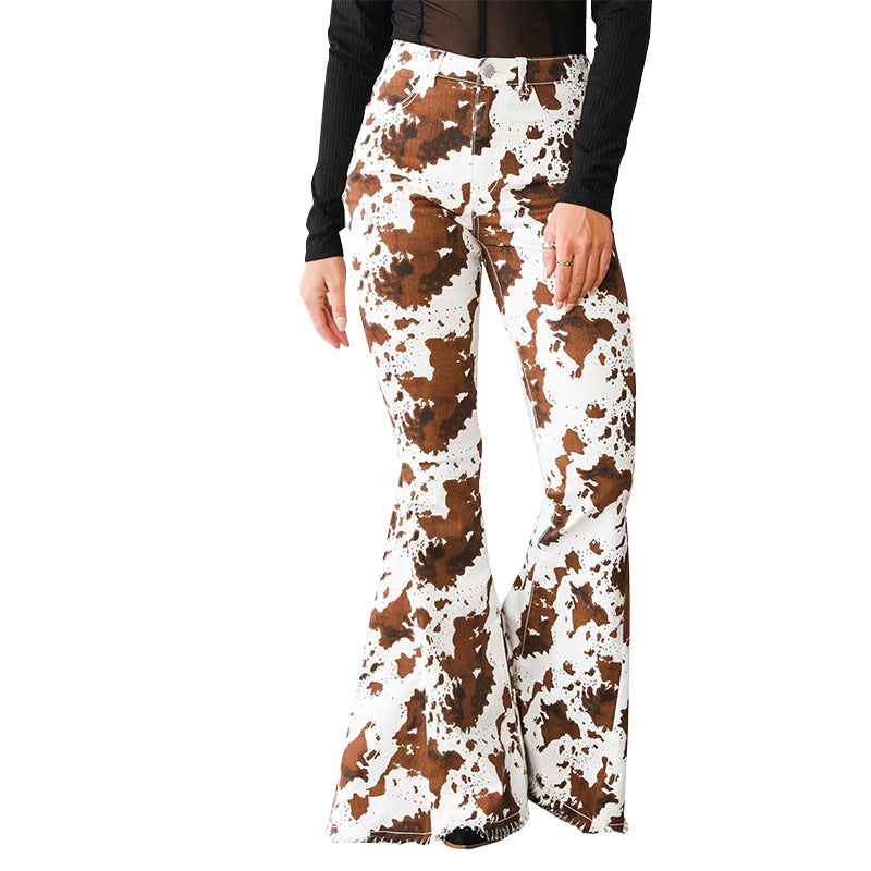 Damen Schlagjeans im trendigen Kuhmuster Stalluxe