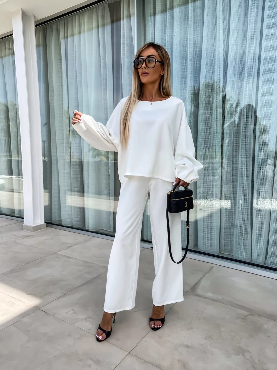 Damen eleganter Jumpsuit mit weitem Schnitt und voluminösen Ärmeln Stalluxe