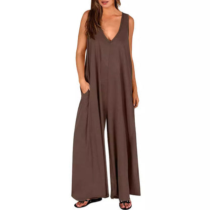 Damen Luftiger Jumpsuit mit tiefem V-Ausschnitt und seitlichen Taschen Stalluxe
