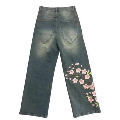 Damen Weite Jeans mit floralen Applikationen Stalluxe