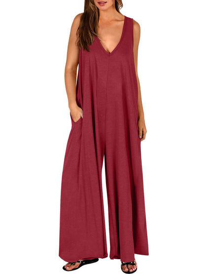 Damen Luftiger Jumpsuit mit tiefem V-Ausschnitt und seitlichen Taschen Stalluxe