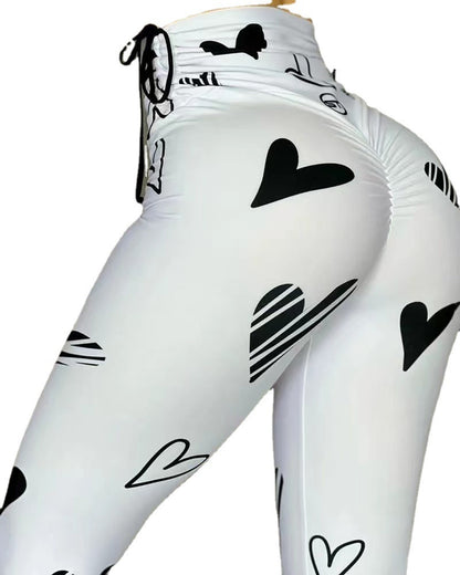 Damen Hochbund-Leggings mit grafischem Herzmuster und hochelastischem Material Stalluxe