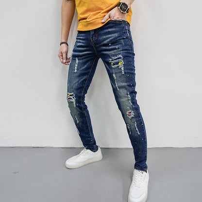 Herren Skinny Fit Jeans mit kreativen Farbklecksen und Rissdesign Stalluxe