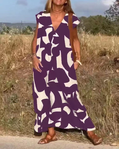 Damen lässiges Maxikleid mit kreativem Muster und tiefem V-Ausschnitt Stalluxe
