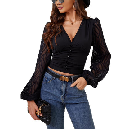 Damen Bluse mit eleganten, transparenten Ärmeln und knopfverzierten Details Stalluxe