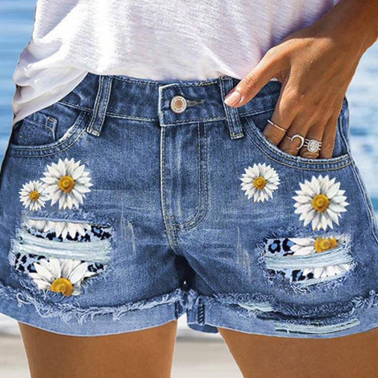 Damen Jeansshorts mit auffälligen Blumenapplikationen und lässigem Schnitt Stalluxe