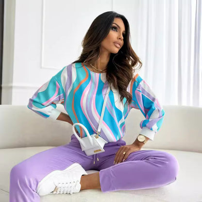 Damen lässiges Sweatshirt mit buntem Blumenmuster und überschnittenen Schultern Stalluxe