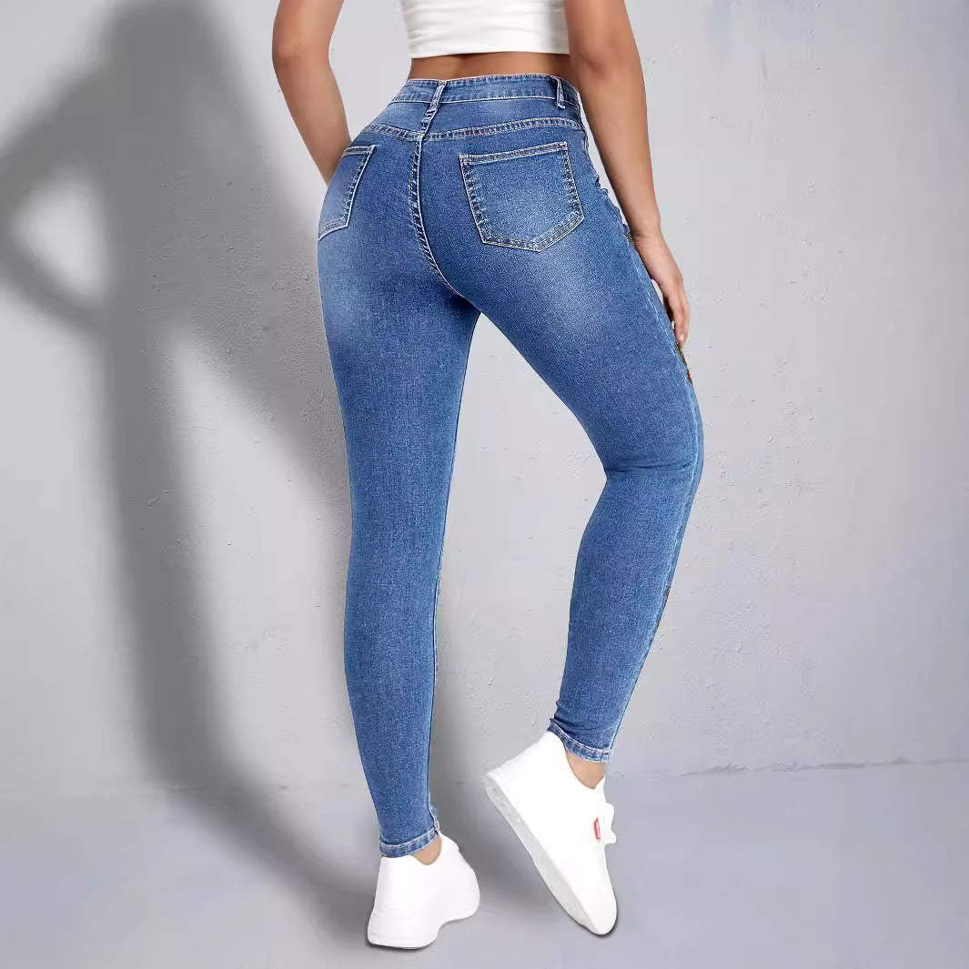 Damen Slim Fit Jeans mit buntem Schmetterlingsmotiv und hohem Bund Stalluxe