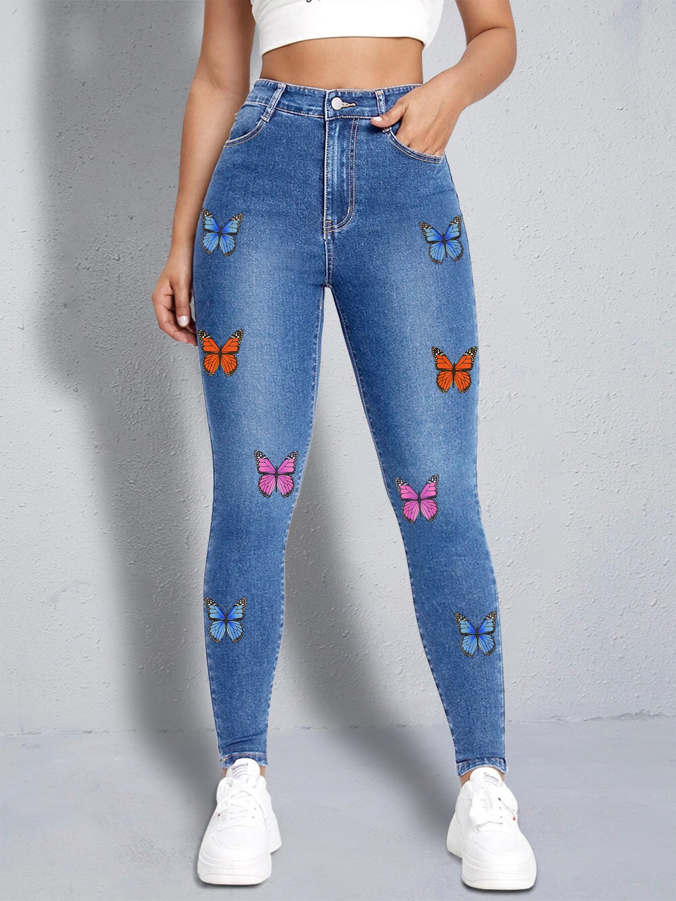 Damen Slim Fit Jeans mit buntem Schmetterlingsmotiv und hohem Bund Stalluxe Mittelblau S