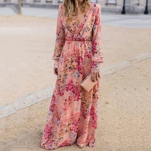 Damen Maxikleid mit voluminösen Ärmeln und elegantem floralem Design Stalluxe