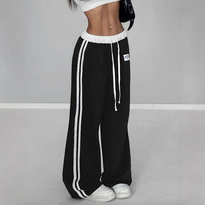 Damen Sportliche weit geschnittene Freizeithose mit elastischem Bund und seitlichen Streifen Stalluxe