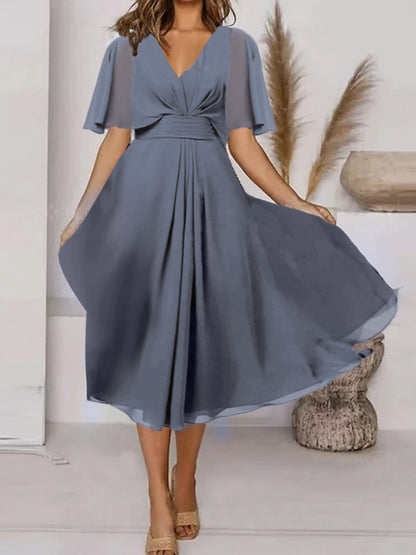 Damen Midikleid mit verspieltem Wickeldesign und eleganten Puffärmeln Stalluxe