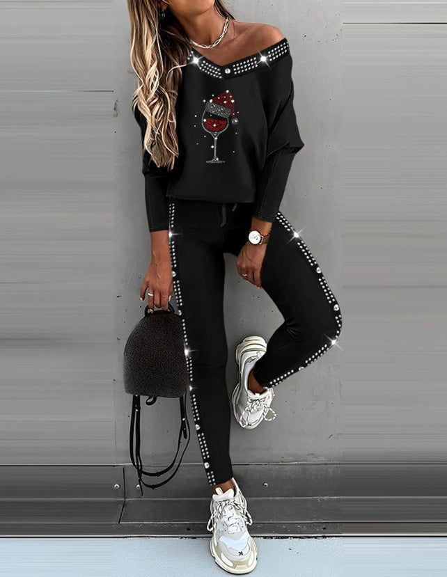 Damen Freizeit Set mit glitzerndem Motiv und offenem Schulterdesign Stalluxe