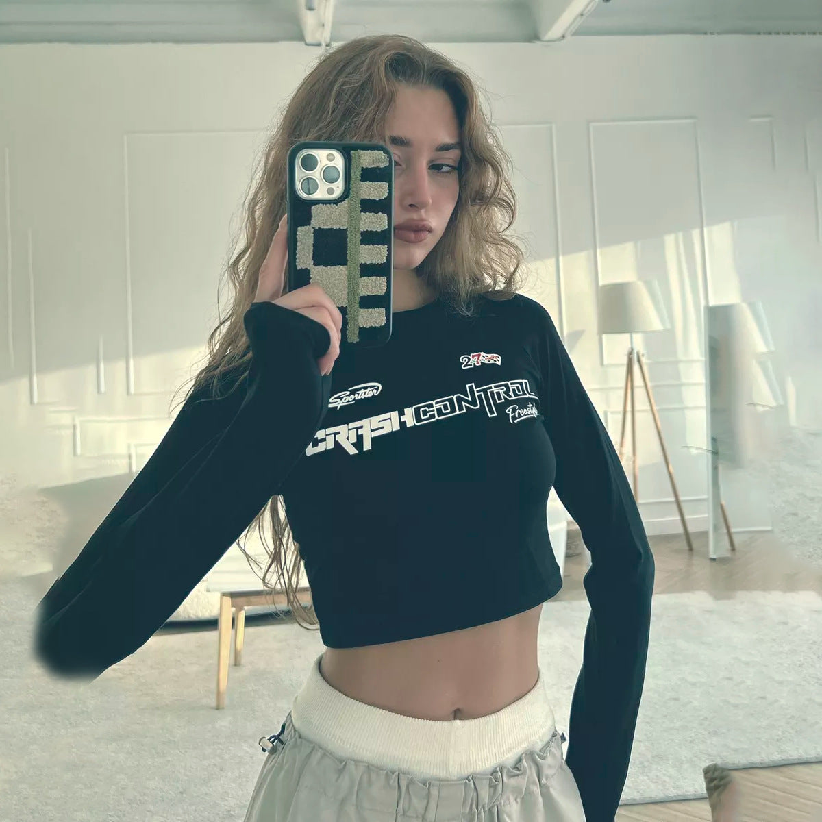 Damen Langärmliges Crop-Top mit auffälligem Grafikdesign Stalluxe