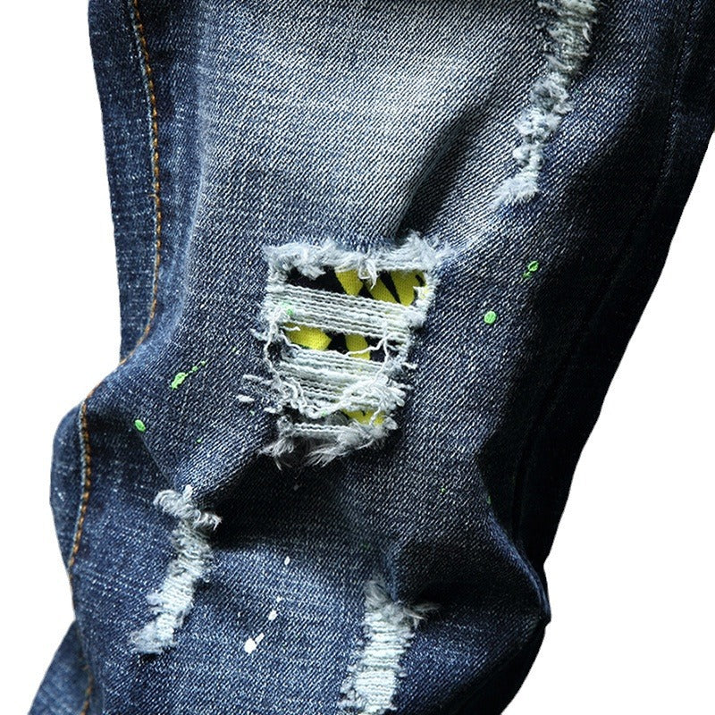 Herren Ripped Slim Fit Jeans mit kreativen Farbklecksen und modischem Destroyed-Look Stalluxe