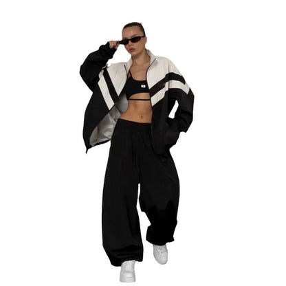 Damen Sportanzug mit Reißverschluss und weit geschnittenen Hosen Stalluxe