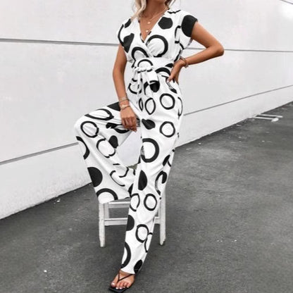Damen Jumpsuit mit modernem Kreismuster und Taillengürtel Stalluxe