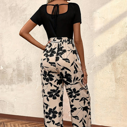 Damen Jumpsuit mit floraler Weite und femininer Taillierung Stalluxe