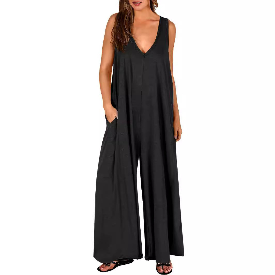 Damen Luftiger Jumpsuit mit tiefem V-Ausschnitt und seitlichen Taschen Stalluxe