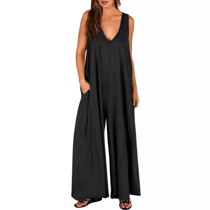 Damen Luftiger Jumpsuit mit tiefem V-Ausschnitt und seitlichen Taschen Stalluxe