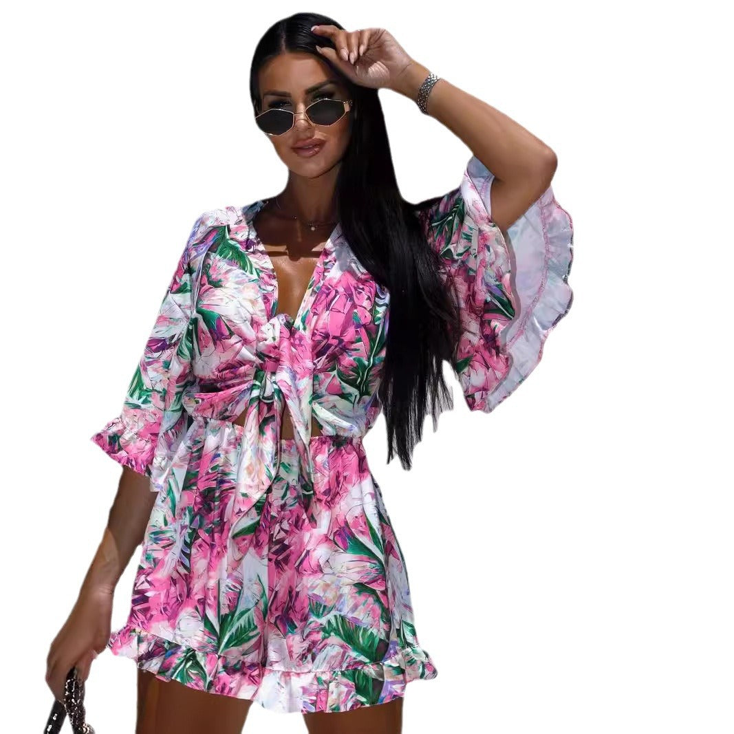 Damen Sommerliches Strandkleid mit floralem Design und Bindedetails Stalluxe