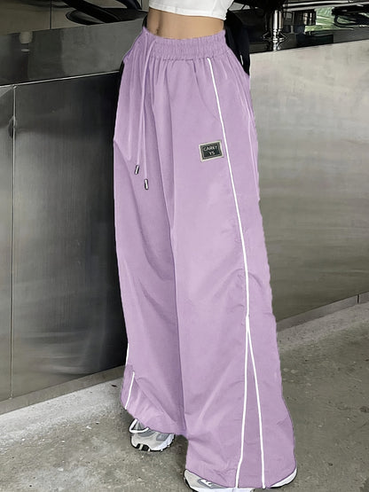 Damen Weiter Sporthose mit seitlichen Reisverschlusstaschen und elastischem Bund Stalluxe
