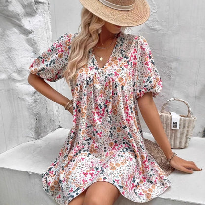 Damen Verspieltes Blümchenkleid mit Puffärmeln und V-Ausschnitt Stalluxe