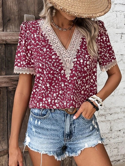 Damen Lockere Bluse mit floralem Muster und Spitzenverzierungen Stalluxe