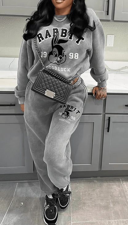 Damen Kuscheliges Sweatshirt und bequeme Jogginghose Set mit kreativen Druckdetails Stalluxe