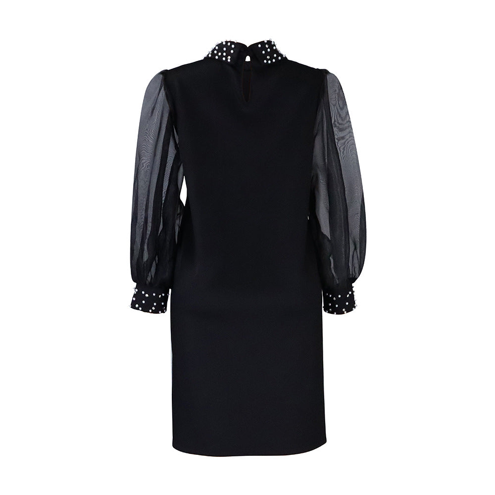 Damen Kleid mit transparenten Ärmeln und Perlenverzierung Stalluxe Schwarz