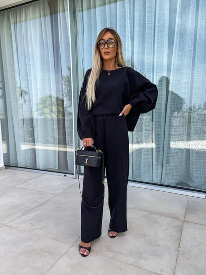 Damen eleganter Jumpsuit mit weitem Schnitt und voluminösen Ärmeln Stalluxe