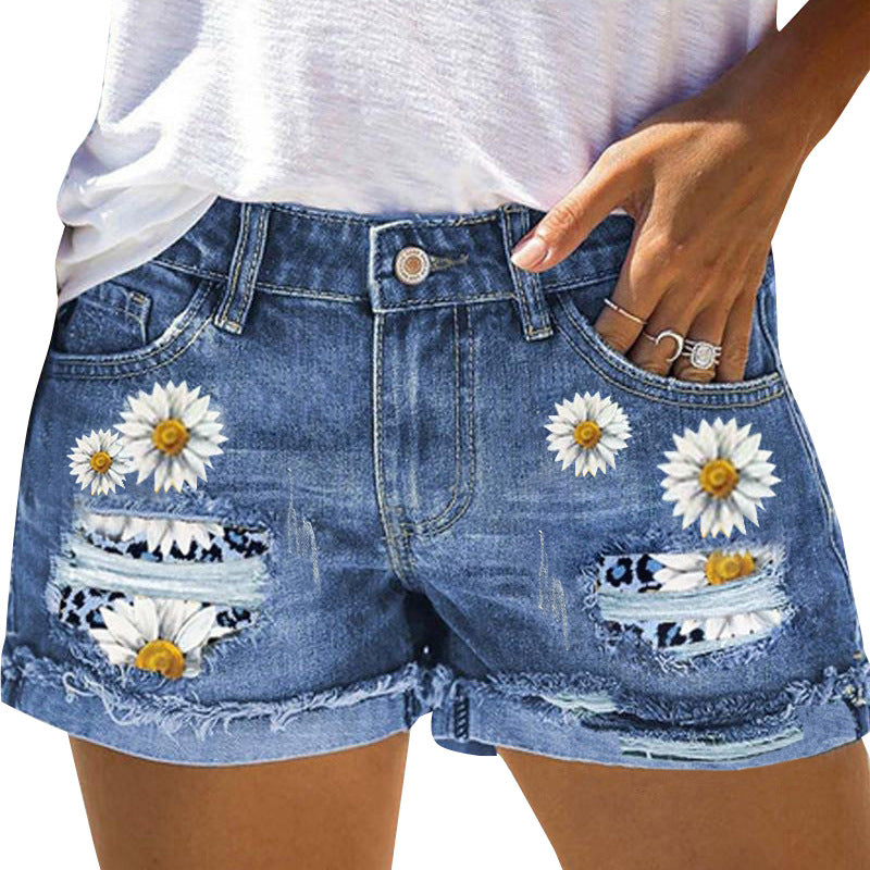 Damen Jeansshorts mit auffälligen Blumenapplikationen und lässigem Schnitt Stalluxe