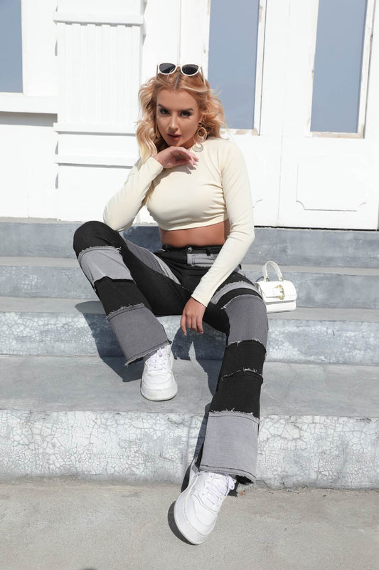Damen Bootcut-Jeans mit modernem Patchwork-Design und lässigen Fransen Stalluxe