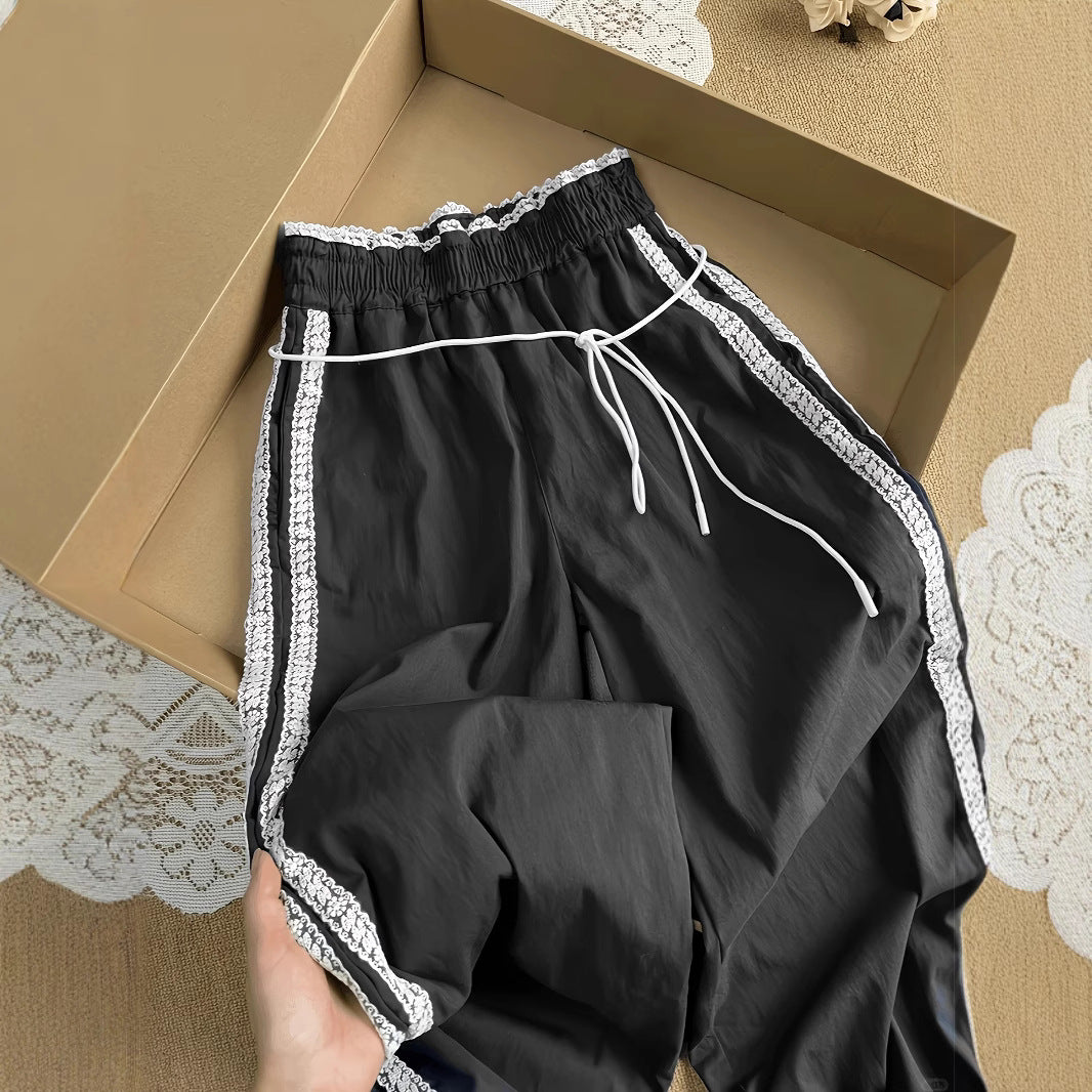 Damen lockere Sporthose mit praktischen Seitentaschen und dekorativen Streifen Stalluxe