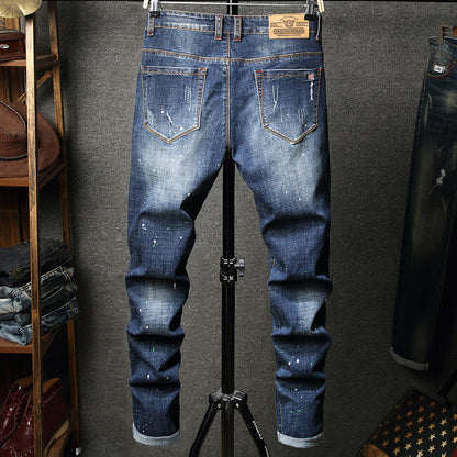 Herren Ripped Slim Fit Jeans mit kreativen Farbklecksen und modischem Destroyed-Look Stalluxe